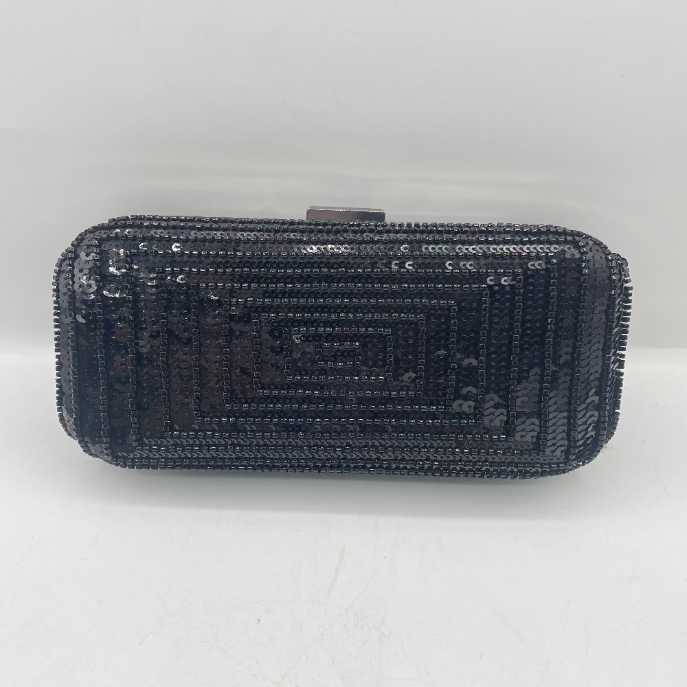 Black beaded clutch bag on a white background